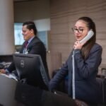 receptionists, phone call, hotel, reception, woman, man, work, attention, lobby, employees, professional, company, assistance, hotel, hotel, hotel, hotel, hotel, reception
